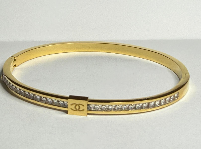 gold bracelet with stones